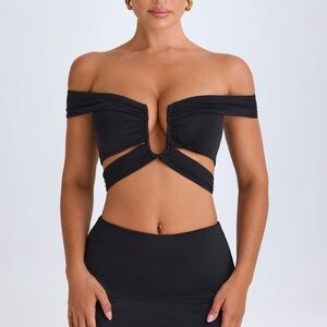 Oh Polly Mid-Rise Micro Mini Skirt in Black Size SS